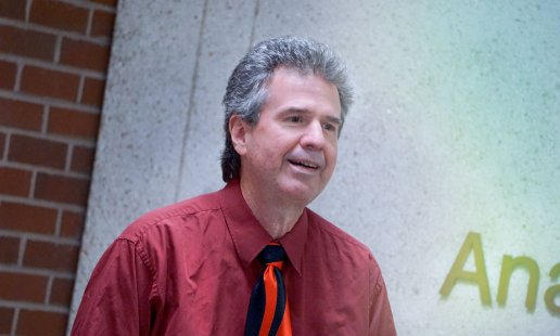 Carl Jagos posing outside the Anatomy Center